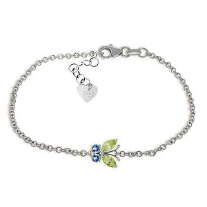 gold bracelet with spiritual charm for positivity-0.6 Carat 14K Solid White Gold Going To Pieces Peridot Blue Topaz Bracelet