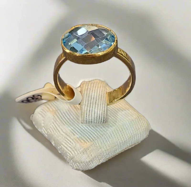 vintage engagement rings for women with diamonds and sapphires-Ring in 14k gold with a blue topaz